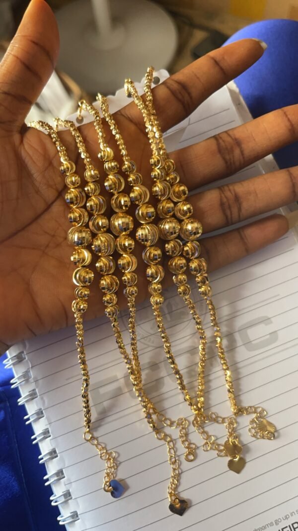 Gold bracelet ( big balls)