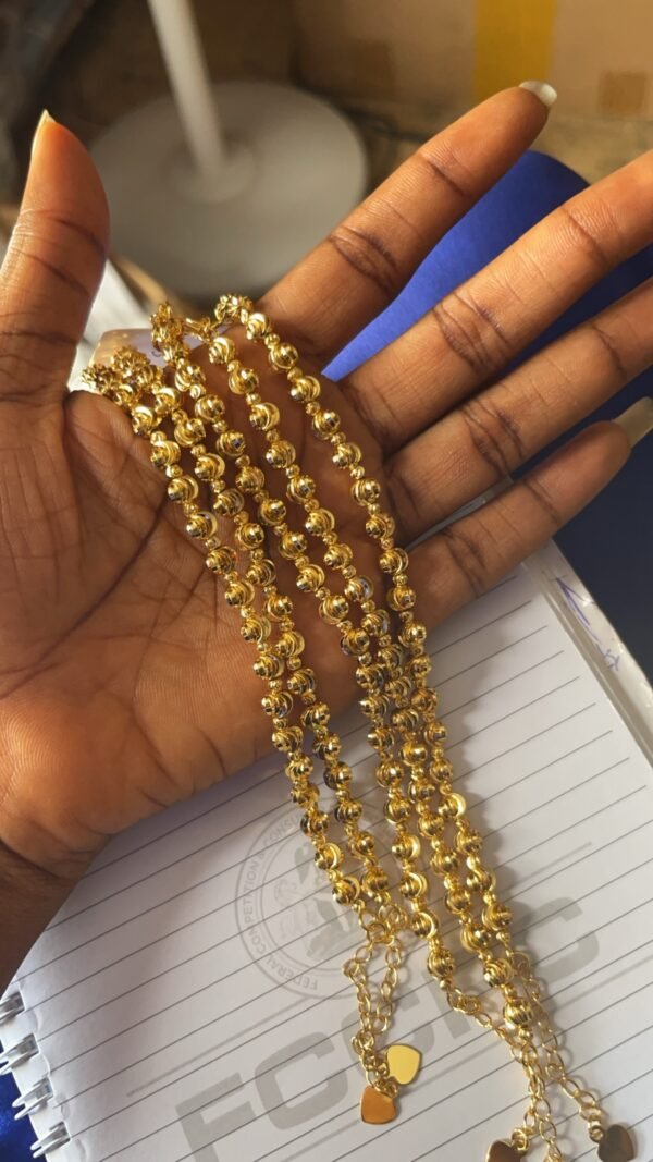 Gold Bracelet( twisted balls)